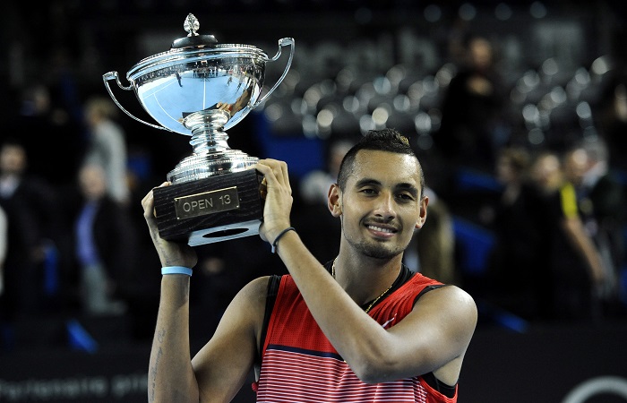 Australia's Nick Kyrgios poses with the trophy after winning the ATP Marseille Open 13 Provence final tennis match against Croatia's Marin Cilic on February 21, 2016 in Marseille, southern France.  / AFP / Franck PENNANT        (Photo credit should read FRANCK PENNANT/AFP/Getty Images)