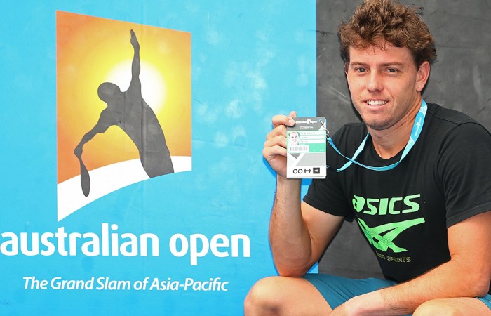 James Duckworth poses with his Australian Open player accreditation pass after winning the Australian Open 2016 Play-off; Getty Images