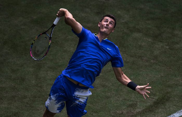 Tomic-serves-to-Haas-700x450