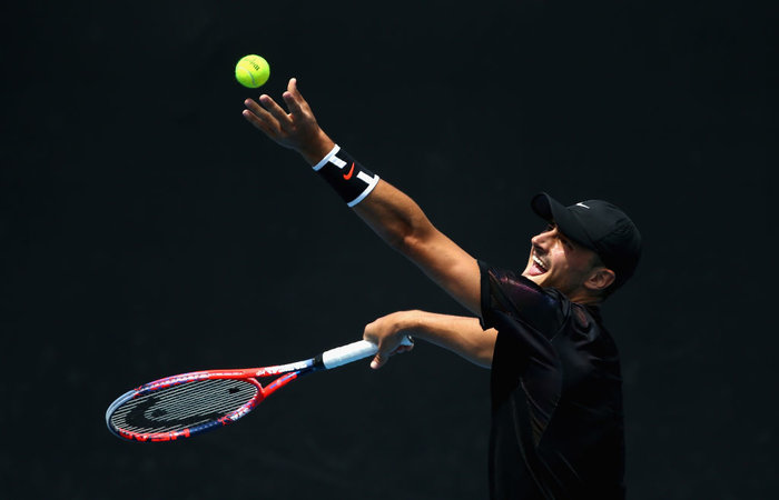 MELBOURNE, AUSTRALIA - JANUARY 14:  Bernard Tomic of Australia competes in his third round match against Lorenzo Sonego of Italy during 2018 Australian Open Qualifying at Melbourne Park on January 14, 2018 in Melbourne, Australia.  (Photo by Robert Prezioso/Getty Images)