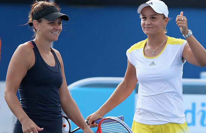 MELBOURNE, AUSTRALIA - JANUARY 21:  Ashleigh Barty (R) of Australia celebrates winning her third round doubles match with Casey Dellacqua (L) of Australia against Natalie Grandin of South Africa and Vladimira Uhlirova of the Czech Republic during day eight of the 2013 Australian Open at Melbourne Park on January 21, 2013 in Melbourne, Australia.  (Photo by Michael Dodge/Getty Images)