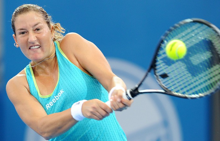 Shahar Peer hits a backhand during her win over Sophie Ferguson of Australia in the first round of the Brisbane International.  AFP PHOTO/William WEST 