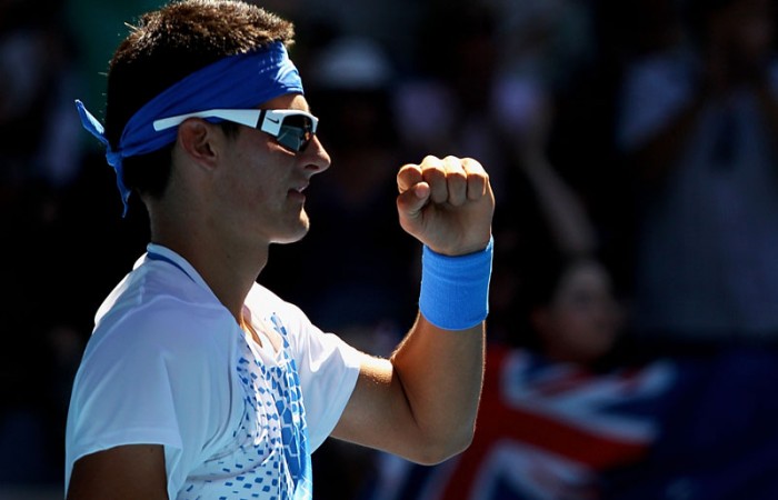 Bernard Tomic celebrates his second round win.