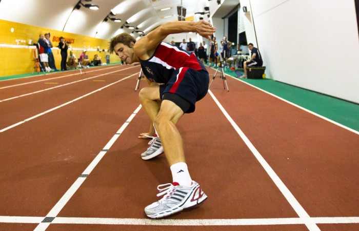 Ben Mitchell stretches during an agility test at the AIS. Tennis Australia.