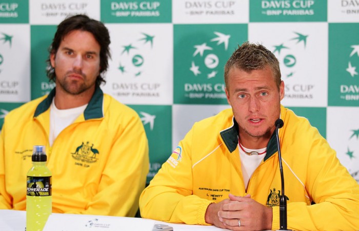 Pat Rafter (left) and Lleyton Hewitt speak to the media. GETTY IMAGES