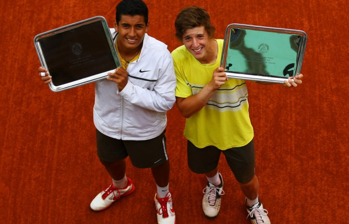 Nick Kyrgios (L) and Andrew Harris of Australia pose with their trophies after winning their boys doubles final against Adam Pavlasek and Vaclav Safranek of the Czech Republic at the French Open; Getty Images
