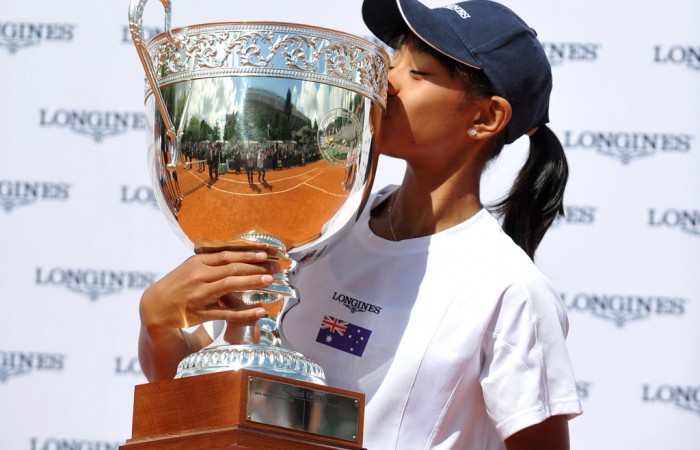 Australian Destanee Aiava kisses the trophy after winning the Longines Future Aces event at Roland Garros, an event for top international juniors aged 13-and-under; Longines
