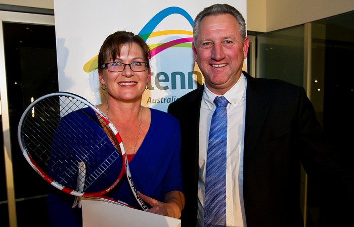 Senator the Honourable Kate Lundy, Minister for Sport, Minister for Multicultural Affairs, Minister Assisting for Industry and Innovation receives a tennis racquet signed by Samantha Stosur from Tennis Australia CEO Steve Wood at the 2012 Australian Tennis Conference. Mark Riedy.