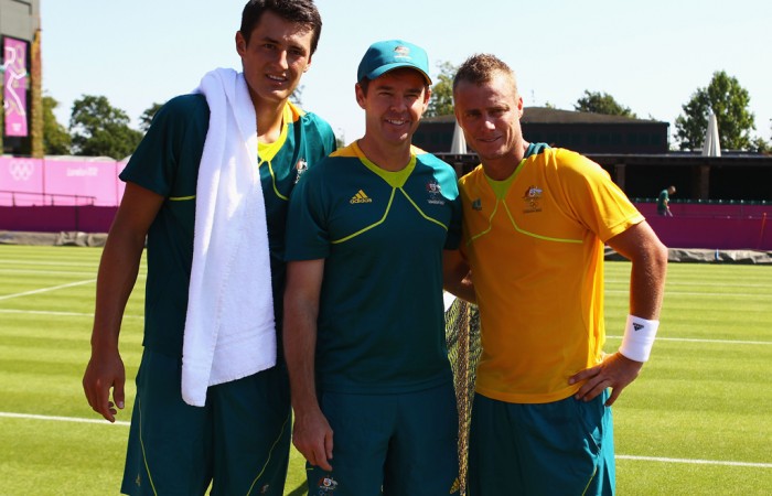 (L-R) Bernard Tomic, Head of Professional Tennis Todd Woodbridge and Lleyton Hewitt following the Australian team's practice session ahead of the 2012 London Olympic Games at Wimbledon; Getty Images
