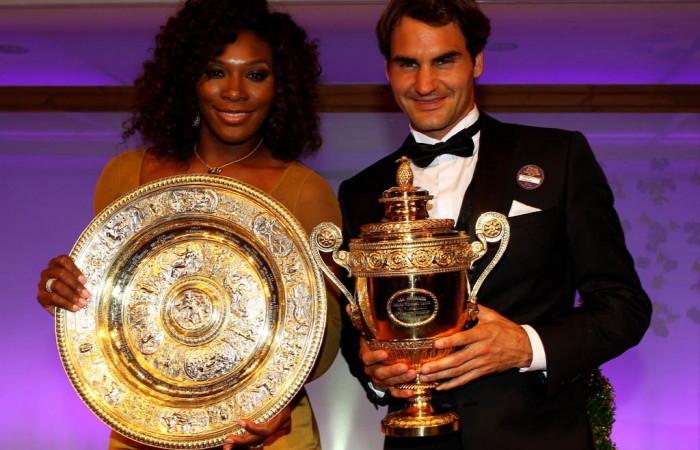 Wimbledon singles champions Serena Williams (L) and Roger Federer pose with their trophies at the Wimbledon Championships 2012 Winners Ball at the InterContinental Park Lane Hotel in London, England; Getty Images