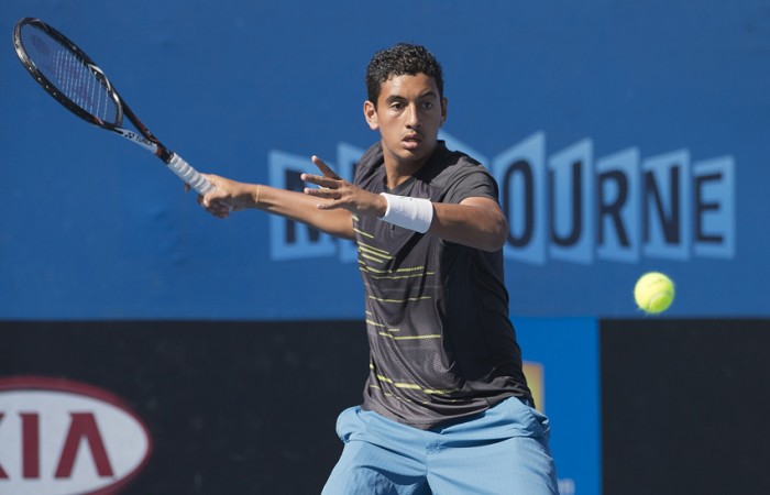 Nick Krygios in action at the Optus 18s Australian Championships; Emily Mogic