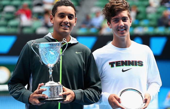 Nick Kyrgios (L) of Australia celebrates with the championship trophy and  Thanasi Kokkinakis of Australia with the runners up plate after their junior boys' final match during the 2013 Australian Open Junior Championships at Melbourne Park on January 26, 2013 in Melbourne, Australia; Getty Images