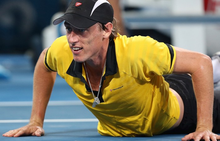 John Millman of Australia slips during his match against Andy Murray of Great Britain during day five of the Brisbane International at Pat Rafter Arena on January 3, 2013 in Brisbane, Australia; Getty Images