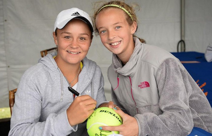 Ash Barty signs an autograph for a fan on Day 5 of the Family Circle Cup in Charleston; Chris Smith/Family Circle Cup