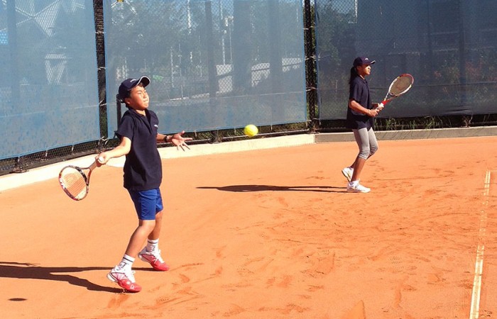 Rinky Hijikata (L), selected to represent Australia at the Longines Future Aces tournament during the French Open, hits with last year's winner Destanee Aiava at the National Tennis Centre clay courts at Melbourne Park; Tennis Australia