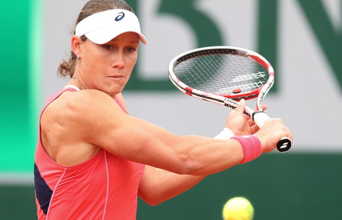 Sam Stosur, playing a backhand in her first round match against Kimiko Date-Krumm of Japan on Day 3 of the French Open, won the opening set in just 21 minutes and raced to a 6-0 3-0 lead; Getty Images