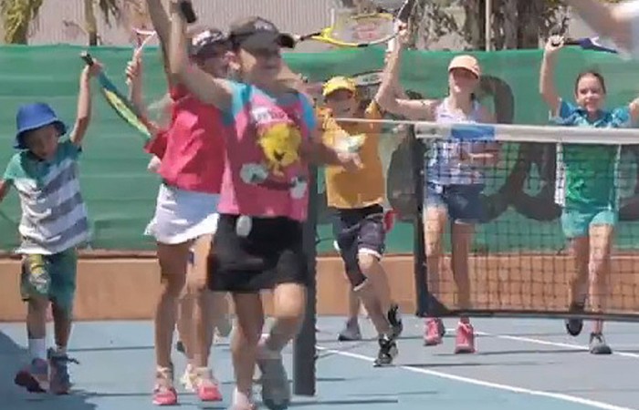 Kids enjoy the tennis action at Gove Peninsula Tennis Club; Tennis Australia