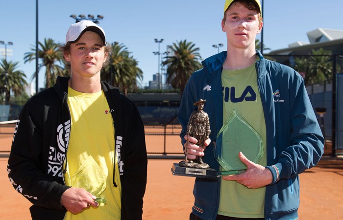 Jake Delaney (R) holds the trophy after winning the final of the Gallipoli Youth Cup at Melbourne Park over Cormac Clissold (L); Elizabeth Xue-Bai