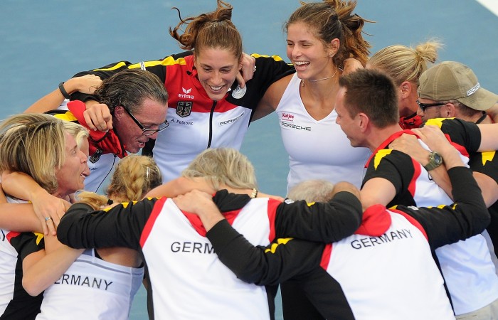 The German team celebrate victory over Australia. Photo by MATT ROBERTS/GETTY IMAGES