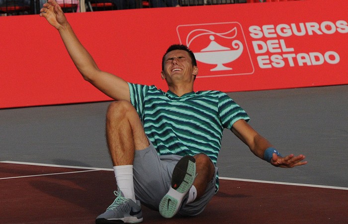 Bernard Tomic celebrates winning match point to clinch the ATP Bogota event; Claro Open Colombia