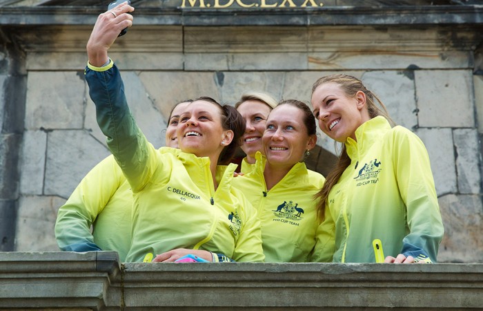 Australia's Fed Cup team of (L-R) Jarmila Gajdosova, Casey Dellacqua, captain Alicia Molik, Sam Stosur and Olivia Rogowska take a selfie at the official draw ceremony ahead of their 2015 World Group Play-off tie against the Netherlands in 's-Hertogenbosch; Henk Koster