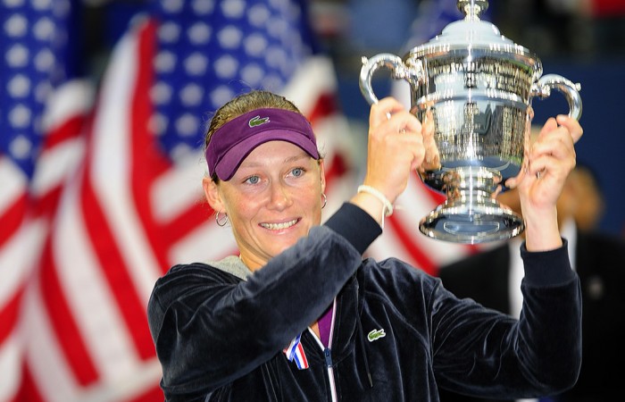 Sam holds the champion's trophy at the 2011 US Open; Getty Images