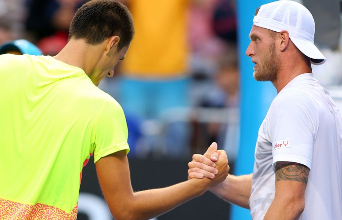 Bernard Tomic (L) and Sam Groth at Australian Open 2015; Getty Images