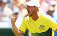 Australian captain Lleyton Hewitt celebrates a winning point to Bernard Tomic in the second singles rubber of the Australia v United States Davis Cup tie at Kooyong Lawn Tennis Club; Getty Images