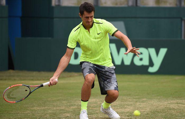 Bernard Tomic hits in Sydney during an Australian Davis Cup team practice session