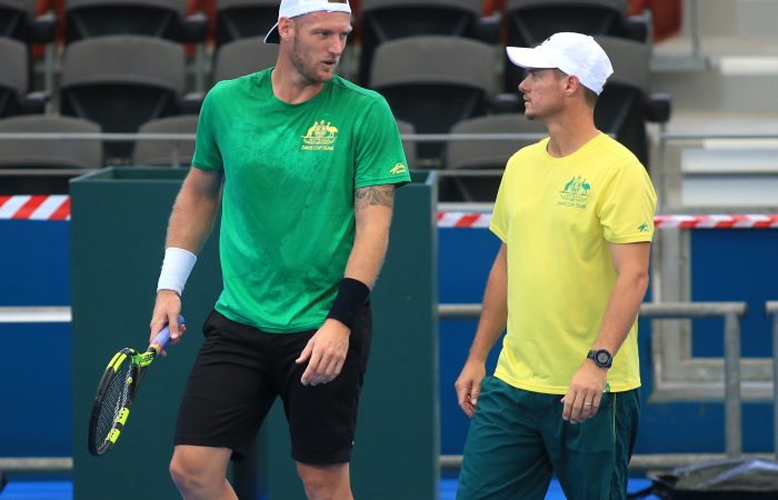 HELPFUL ADVICE: Sam Groth and captain Lleyton Hewitt talk tactics during a practice session; SMP Images
