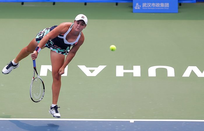 Ash Barty serves to CiCi Bellis during her first-round victory at the WTA tournament in Wuhan; Getty Images