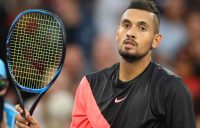 Nick Kyrgios salutes the crowd after dropping just seven games in the first round.