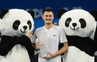 Bernard Tomic of Australia celebrates after winning the men's singles final against Fabio Fognini of Italy at the ATP Chengdu Open tennis tournament in Chengdu, in China's southwest Sichuan province on September 30, 2018. (Photo by STR / AFP) / China OUT (Photo credit should read STR/AFP/Getty Images)