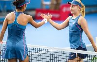 Daria Gavrilova of Australia (R) and Zhang Shuai of China join hands after Zhang won their women's singles quarter-final match at the Hong Kong Open tennis tournament on October 12, 2018. (Photo by Anthony WALLACE / AFP) (Photo credit should read ANTHONY WALLACE/AFP/Getty Images)