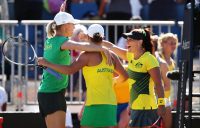 TEAM SPIRIT: Alicia Molik, Ash Barty and Casey Dellacqua celebrate during a Fed Cup in Canberra in February 2018. Picture: Getty Images