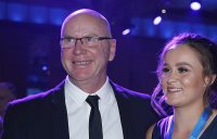 Craig Tyzzer with Ash Barty at the Newcombe Medal. (Getty Images)