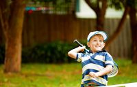 Children are encouraged to play tennis at home during the COVID-19 pandemic.