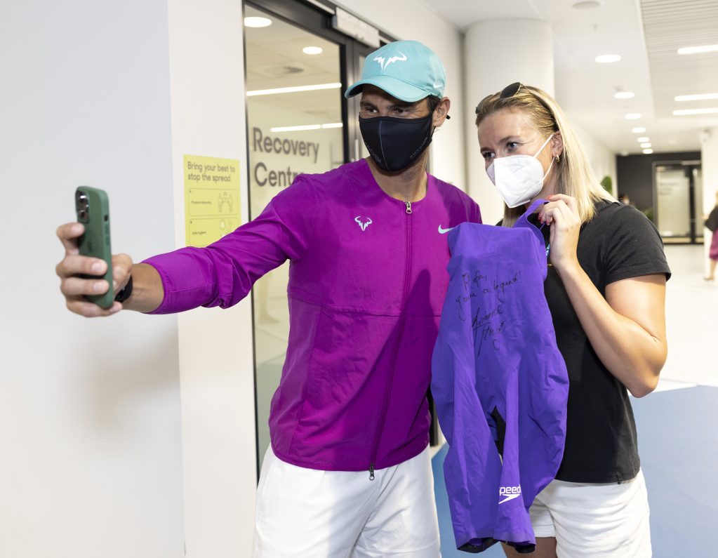 Rafael Nadal takes a selfie with Ariarne Titmus after they exchanged competitive outfits at Australian Open 2022. Picture: Tennis Australia