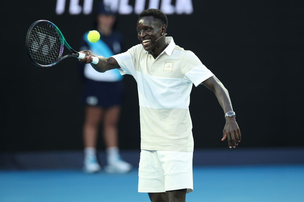 Peter Bol hitting with Novak Djokovic during Australian Open 2024. Picture: Getty Images