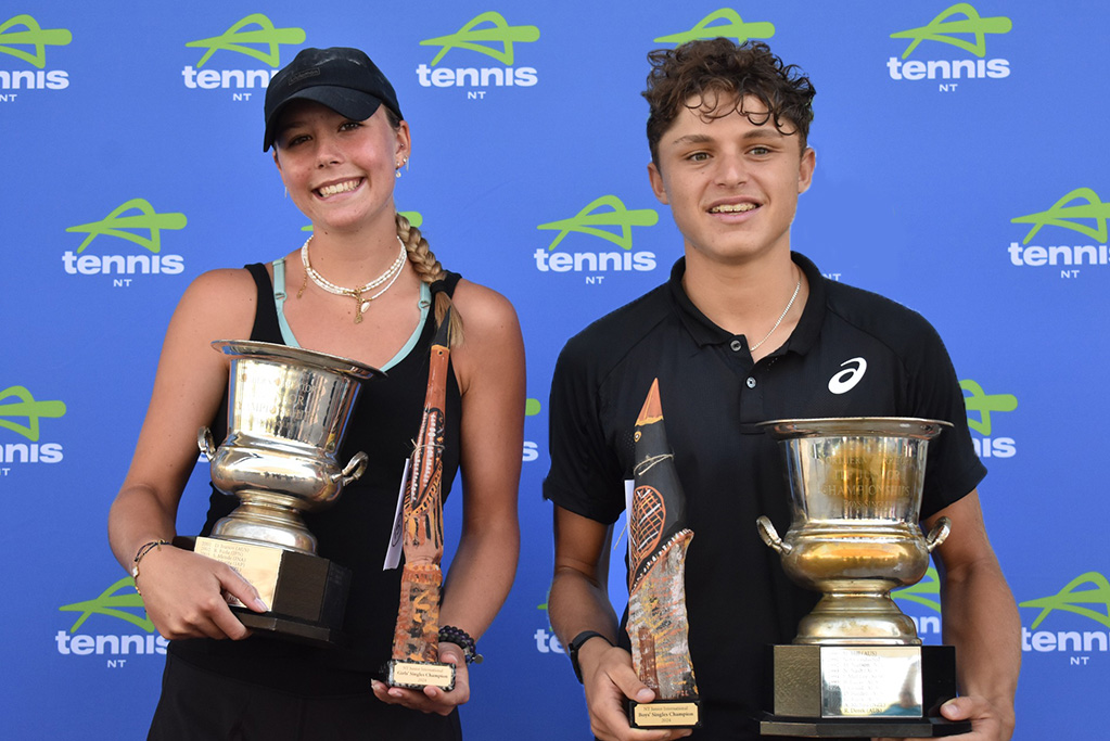 Georgia Campbell and Ashton McLeod celebrate winning ITF J60 singles titles in Darwin.