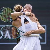 Ellen Perez and Nicole Melichar-Martinez embrace after winning the Bad Homburg doubles title.