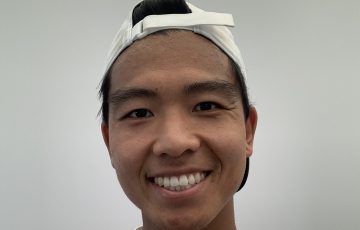 A happy Li Tu after his first-round qualifying win at Wimbledon 2024.