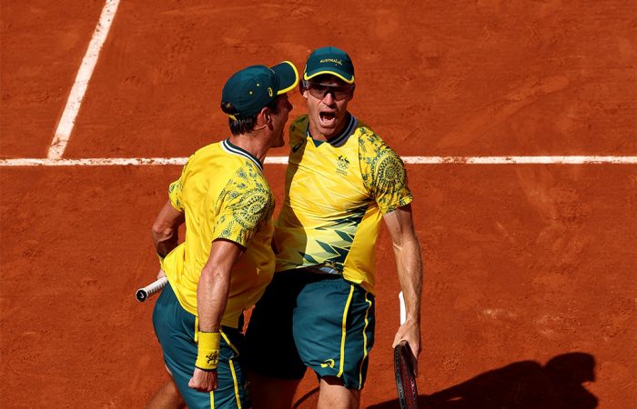 Matt Ebden (L) and John Peers celebrate their men's doubles semifinal victory at the Paris 2024 Olympics. (Getty Images)