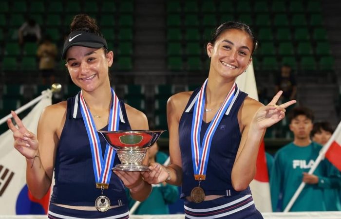 Rene Alame and Liana Alame holding the Osaka J500 Trophy.