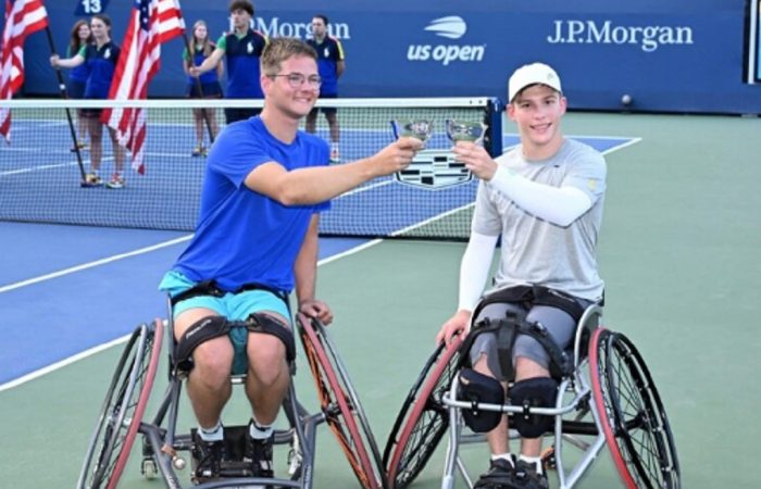 Ivar van Rijt and Benjamin Wenzel celebrate winning the US Open 2024 boys' wheelchair doubles title. 