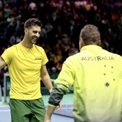 Thanasi Kiokkinakis celebrates with Australian Davis Cup Captain Lleyton Hewitt; Getty Images 